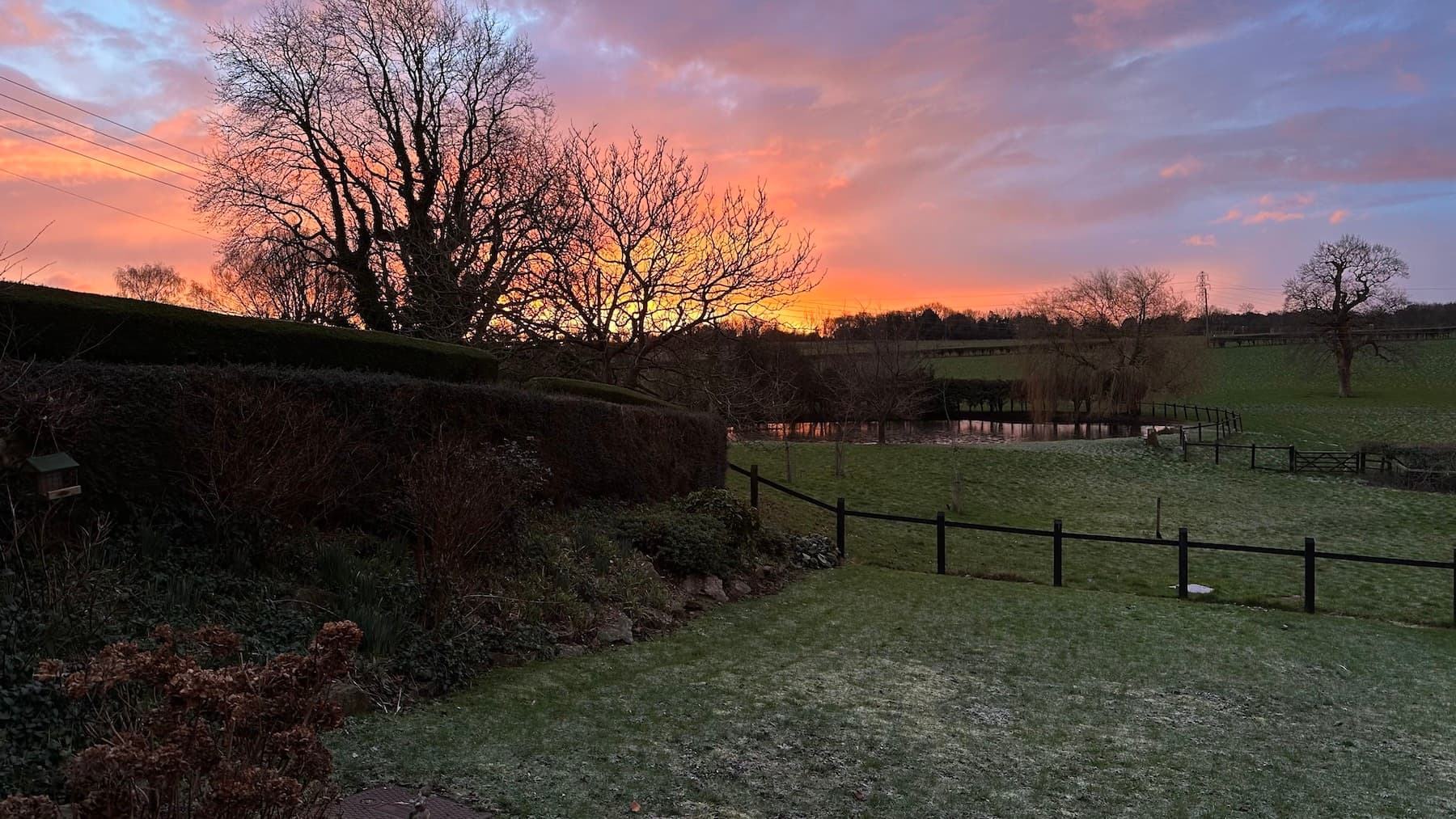 Sunrise over the pond and gardens at the retreat cottage